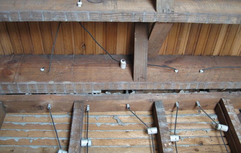 Picture of old knob and tube wiring in the basement of an old Salem County home. Featured image for Selling A Home with Knob and Tube Wiring by Scott Kompa | The News of Salem County