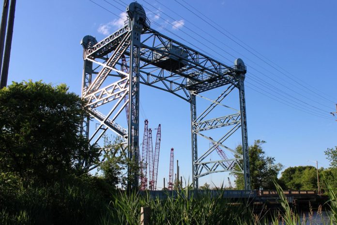 View from the side afar of the Nortonville Bridge Historic Truss Bridge in Oldmans Township View from the side afar of the Nortonville Bridge Historic Truss Bridge in Oldmans Township