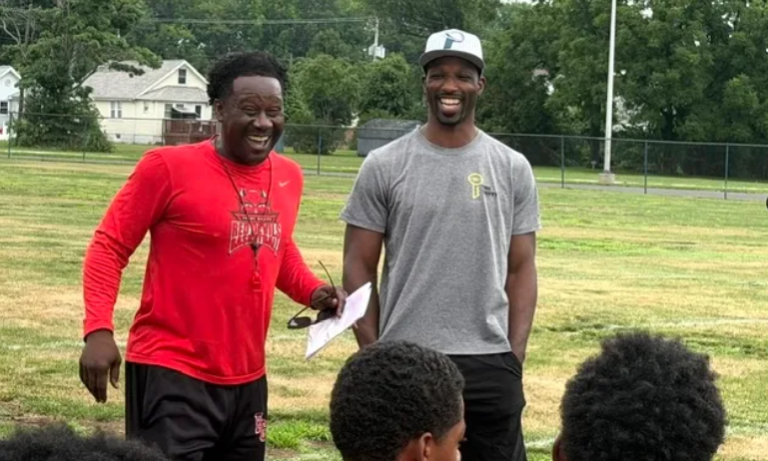 Penns Grove football coach Damian Ware introduces his friend and former NFL receiver Jason Avant to the Red Devils Tuesday morning.