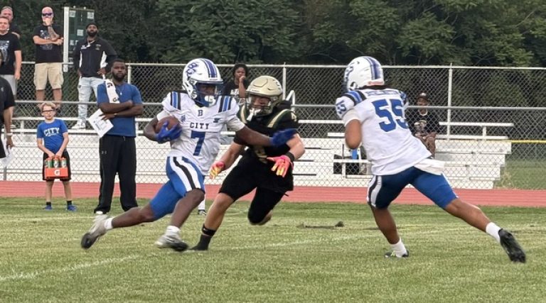 Schalick’s Nick Lopergolo draws a bead on Burlington City’s Darius Davis.