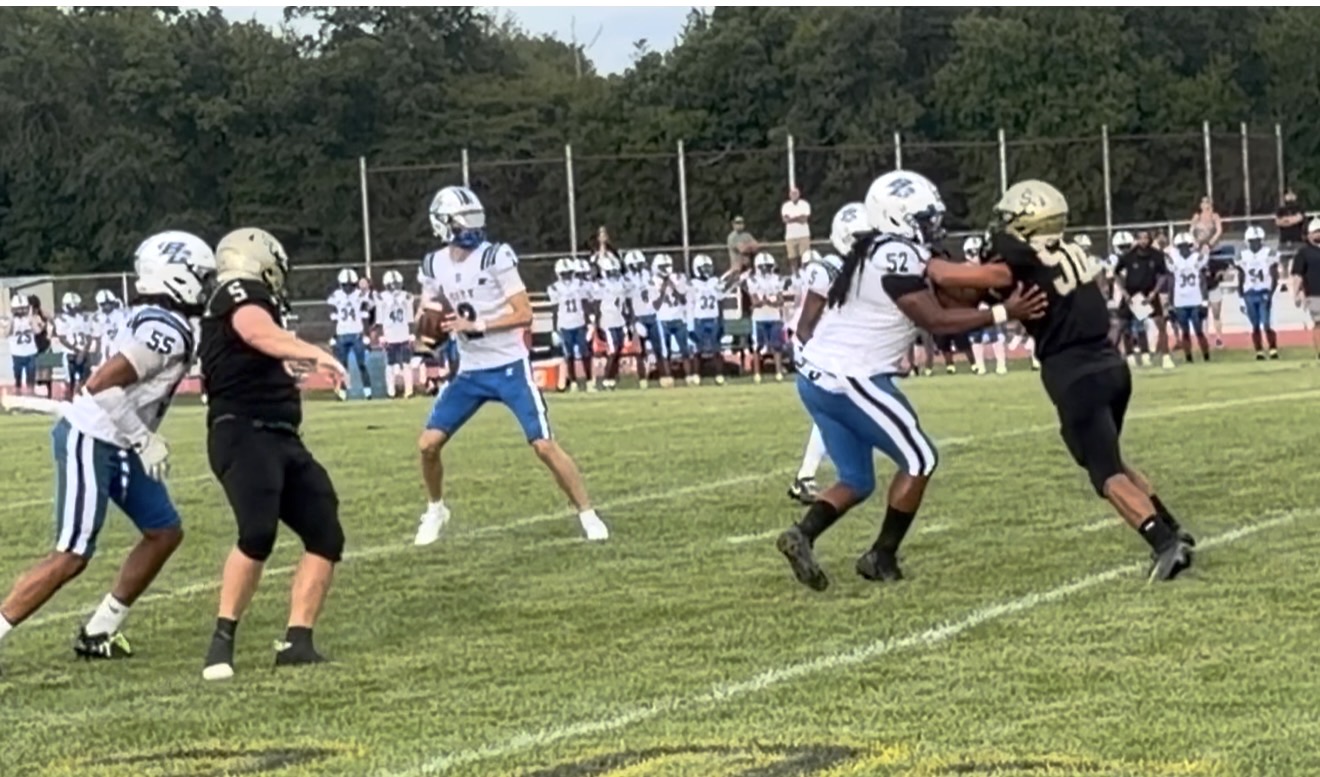 The Burlington City line does a good job protecting quarterback Mason Shansey on this play, but the Schalick defense had him on the run all game.