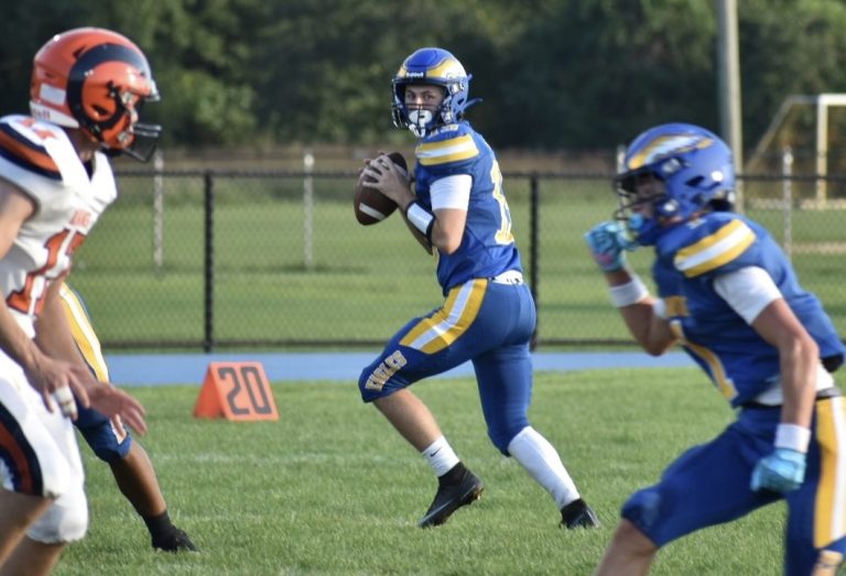 Pennsville quarterback Jake Layfield looks for an open receiver against Overbrook.