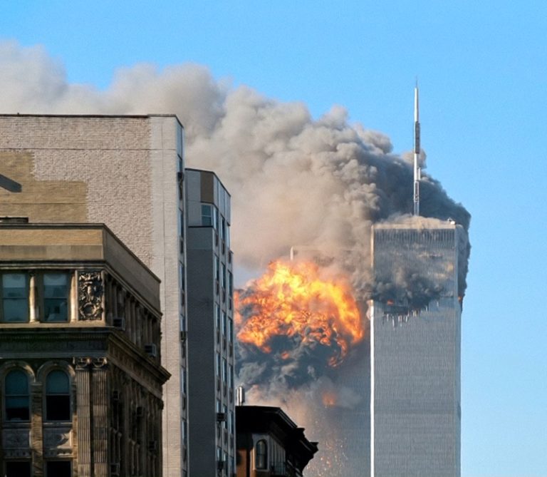 The northeast face of Two World Trade Center (south tower) after being struck by plane in the south face. Image is a cropped version of File:UA Flight 175 hits WTC south tower 9-11